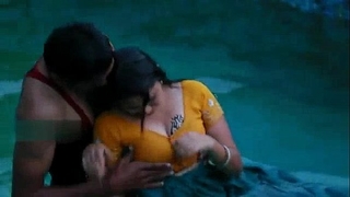 Lovers sexy romance in swimming pool